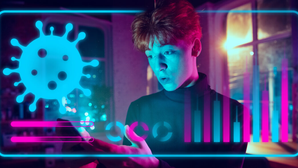 Young man interacting with a futuristic digital interface showing coronavirus data and statistics.
